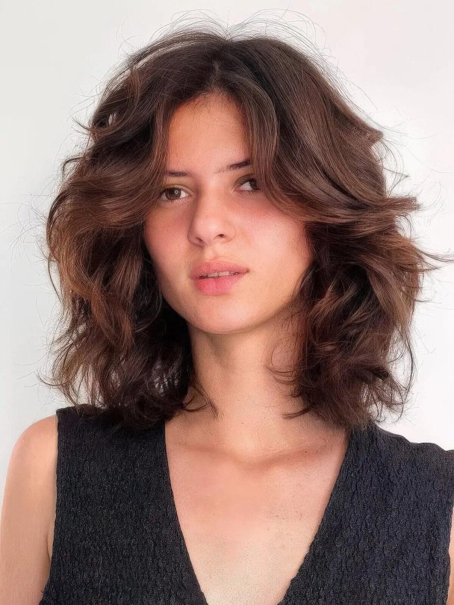 Coupe butterfly cheveux ondulés