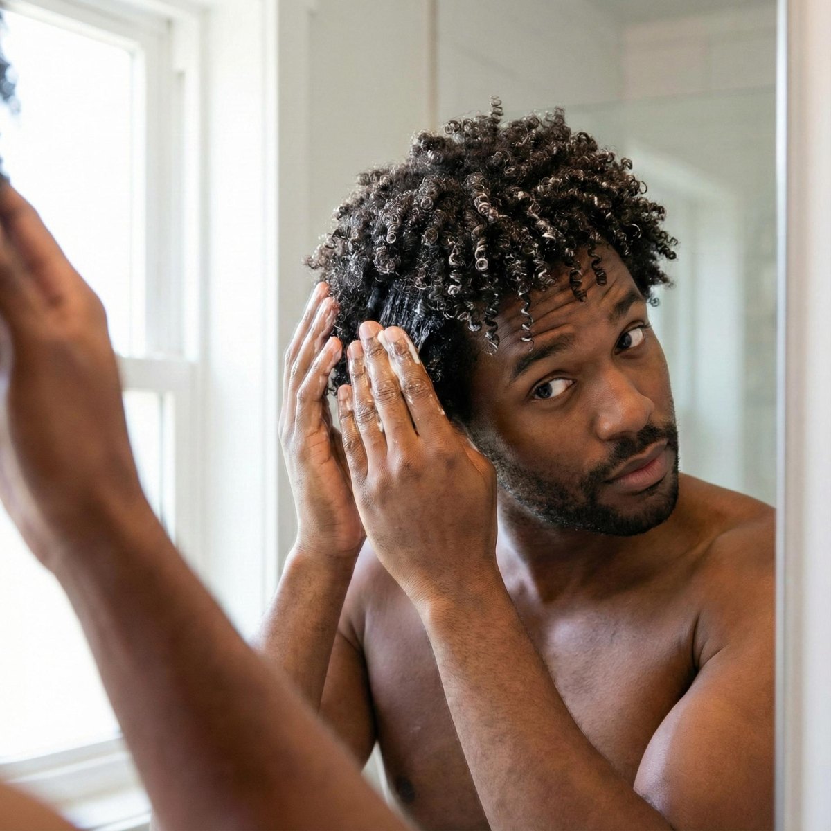 Soin hydratant cheveux bouclés homme