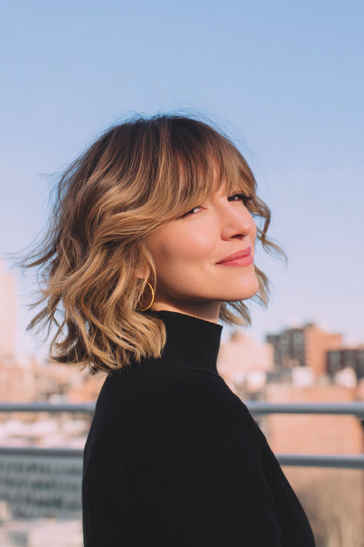 Wavy Blonde Lob With Bangs