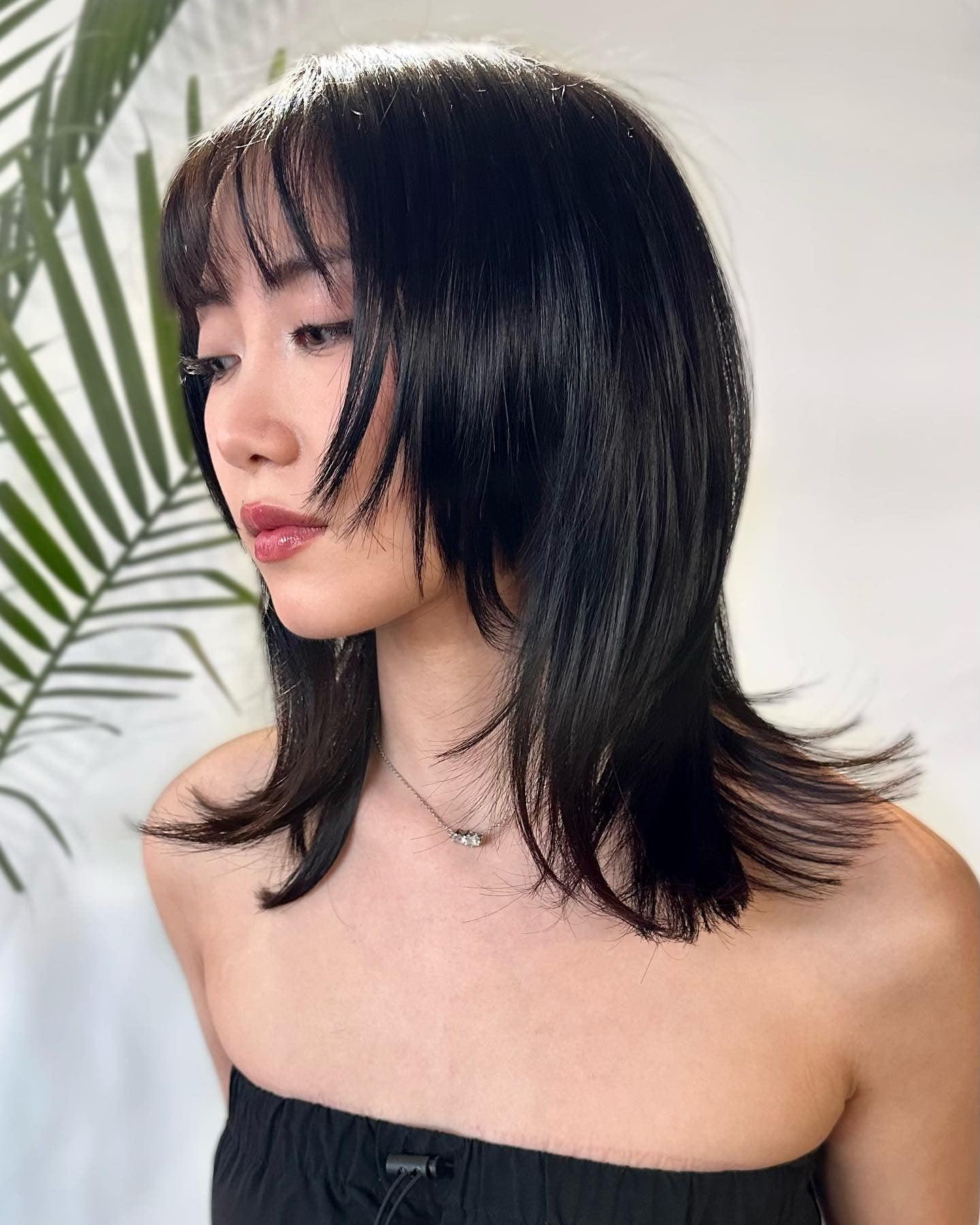 Wolf cut cheveux noirs